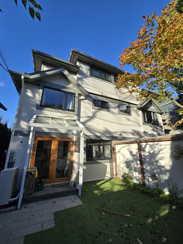 Exterior painting of a grey home